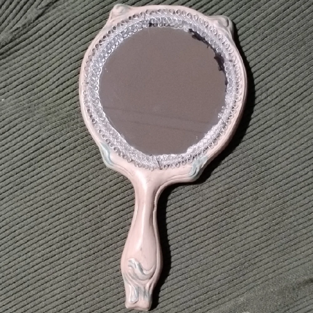 Vintage Handheld Mirror with Floral Design